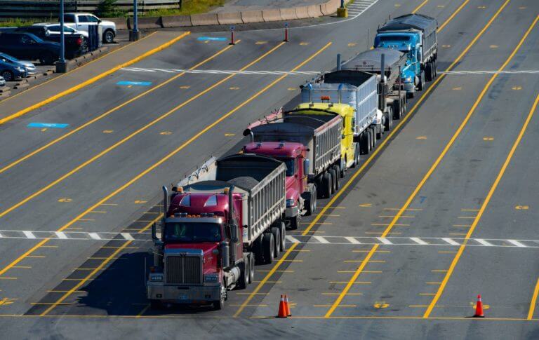 Trucks on marked road