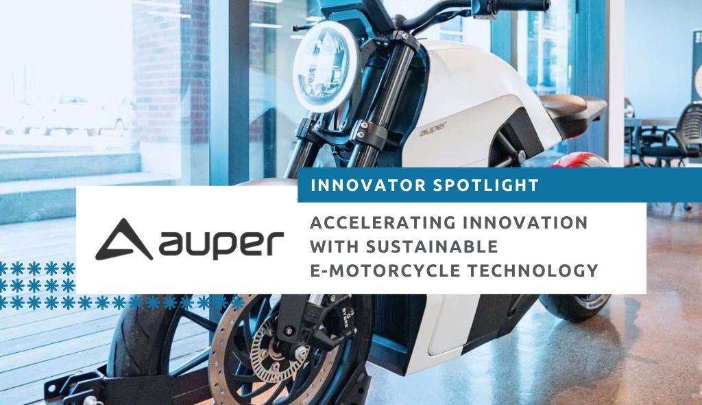 Auper Motorcycle parked near window of Innovation Factory's office space