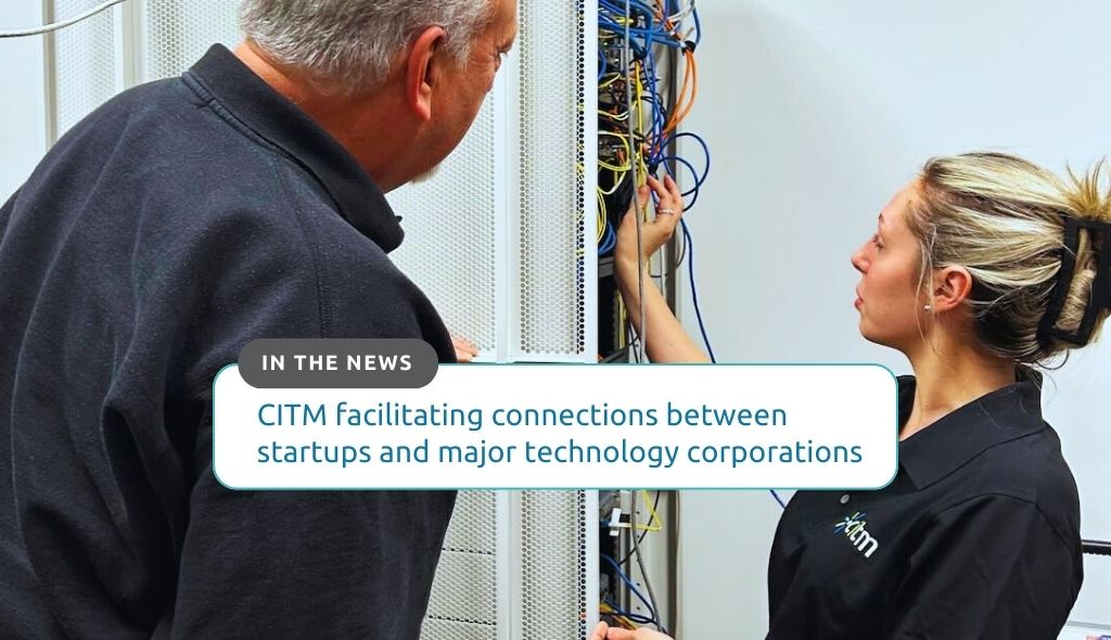 Richard Dunda, director of the Centre for Integrated Transportation and Mobility (CITM) speaks with a young innovator. Text: CITM facilitating connections between startup businesses and major corporations