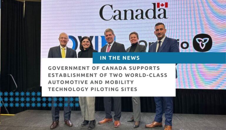 The image features Minister Victor Fedeli and Minister Filomena Tassi with other dignitaries at the Autoshow announcing the $8-million investment through OVIN.